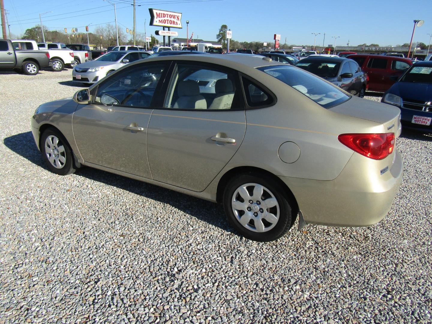 2008 Gold /Tan Hyundai Elantra GLS (KMHDU46DX8U) with an 2.0L L4 DOHC 16V engine, Automatic transmission, located at 15016 S Hwy 231, Midland City, AL, 36350, (334) 983-3001, 31.306210, -85.495277 - Photo#5